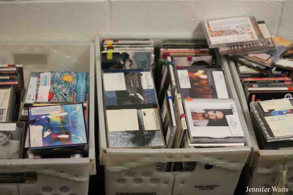 Photo of three U.S. mail bins filled with CDs at college radio station WRPI. Photo: J. Waits