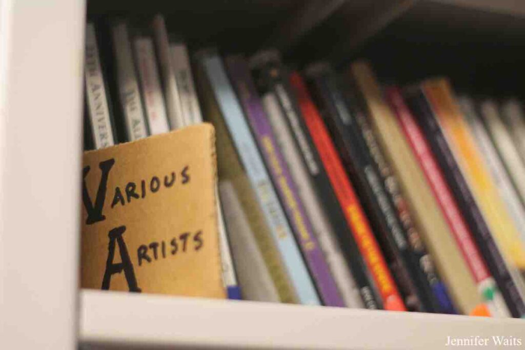 Photo of shelf of CDs in college radio station BSR's studio. Sign reads "various artists." Photo: J. Waits