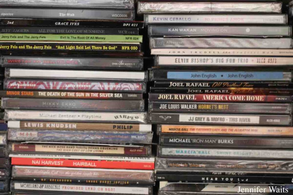 Photo of two stacks of CDs at college radio station WPIR Pratt Radio. Photo: J. Waits