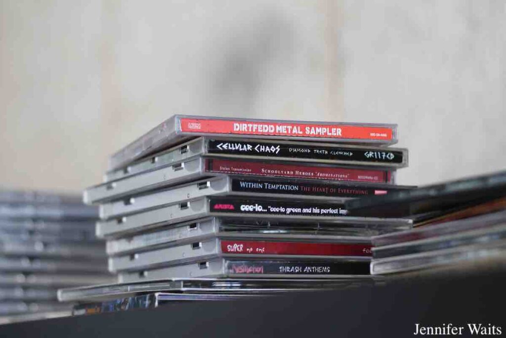Stack of CDs at college radio station WSVA in March, 2023. One is a metal sampler. Photo: J. Waits