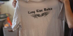 Photo of t-shirt that reads "Long Live Radio." Photo taken by Jennifer Waits at college radio station WYBCx at Yale University in September 2025.