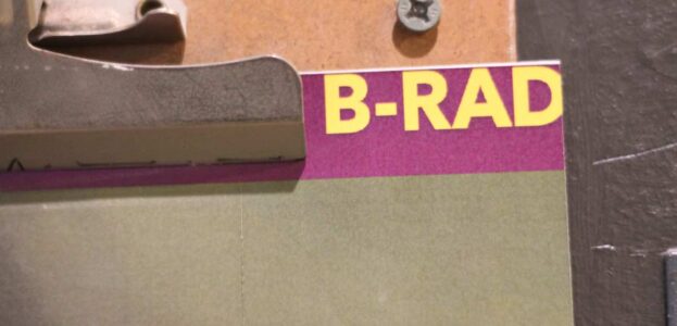 Photo of portion of poster attached to a clipboard. B-RAD can be seen in the corner of the poster. B-Rad is the college radio station at Bennington College. Photo by J. Waits