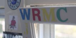 Radio Station Visit #186: WRMC-FM at Middlebury College Photo of window with letters WRMC on it at the Middlebury College radio station. Photo: J. Waits