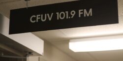 photo of sign that says CFUV 101.9 FM outside of the campus and community radio station. Photo by J Waits